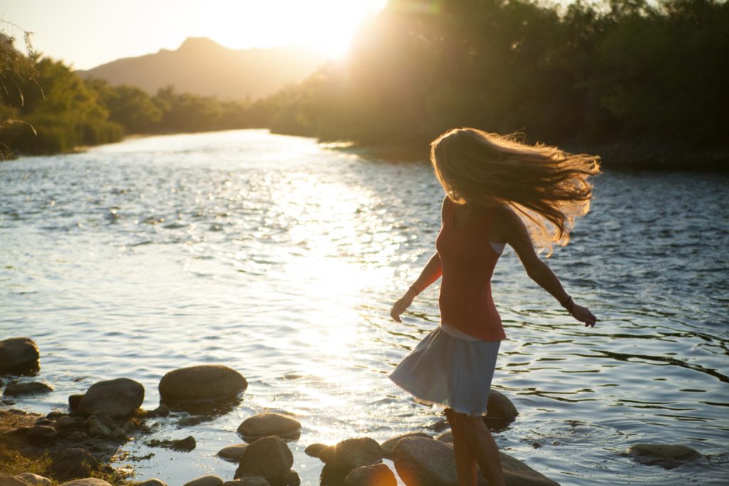 Girl near river Dancing near water
